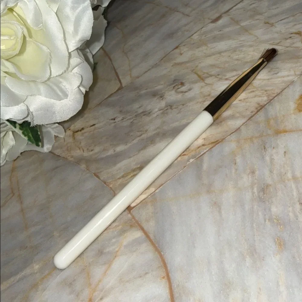 White Makeup Brush with Gold Accent
